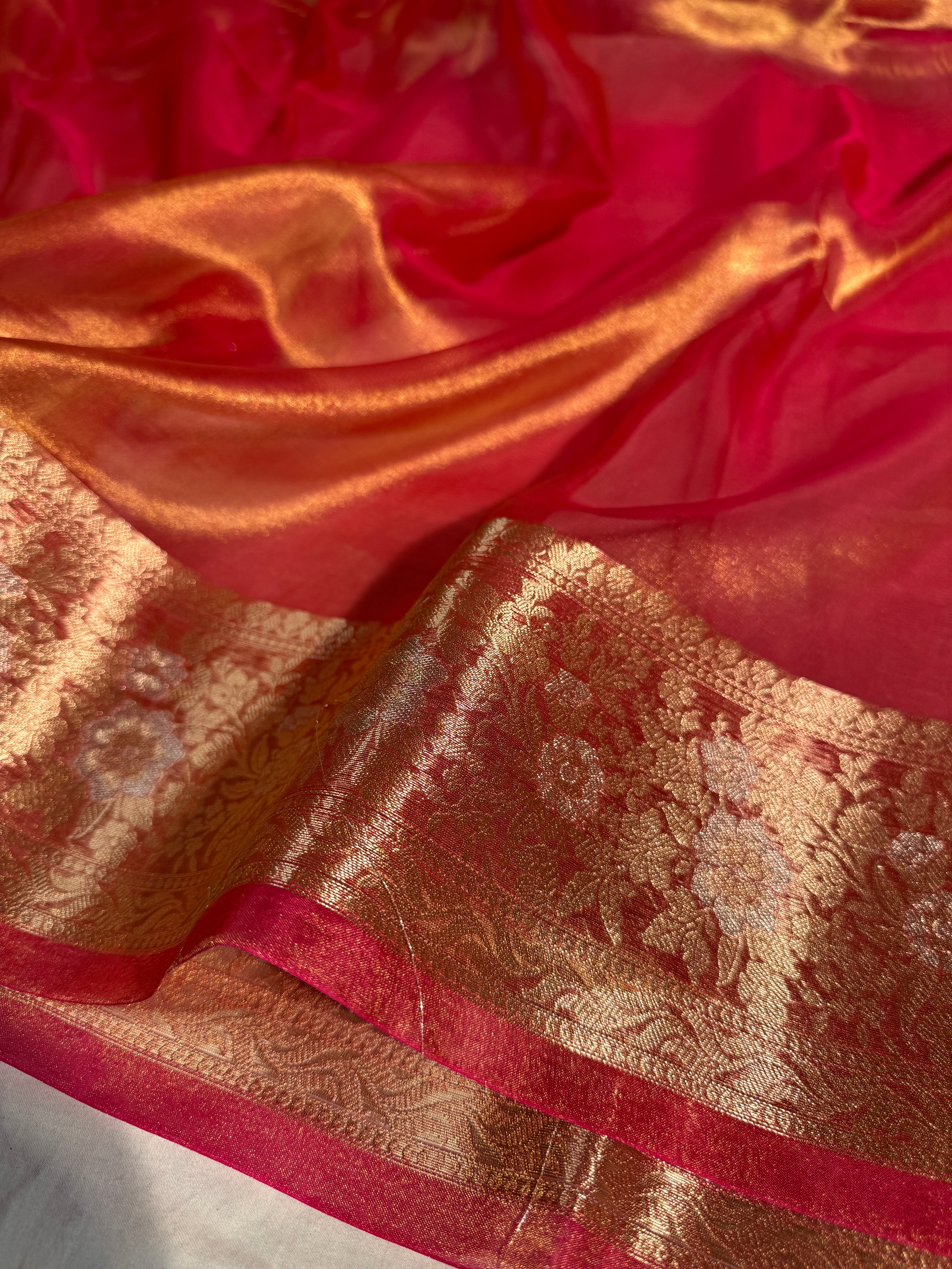 Metallic Orange Pure Tissue Silk Banarasi Saree with Traditional Meenakari Weave Borders