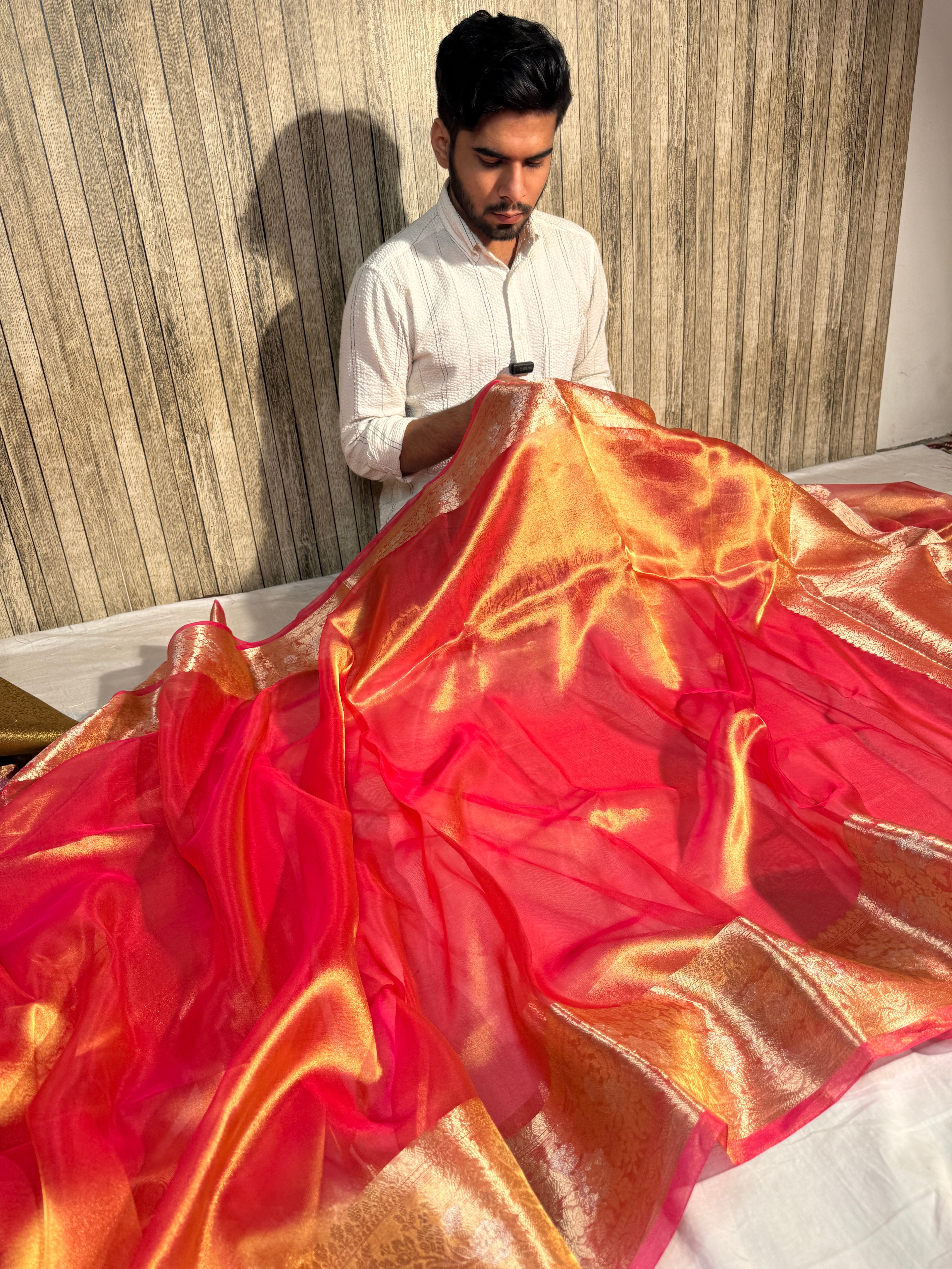 Metallic Orange Pure Tissue Silk Banarasi Saree with Traditional Meenakari Weave Borders