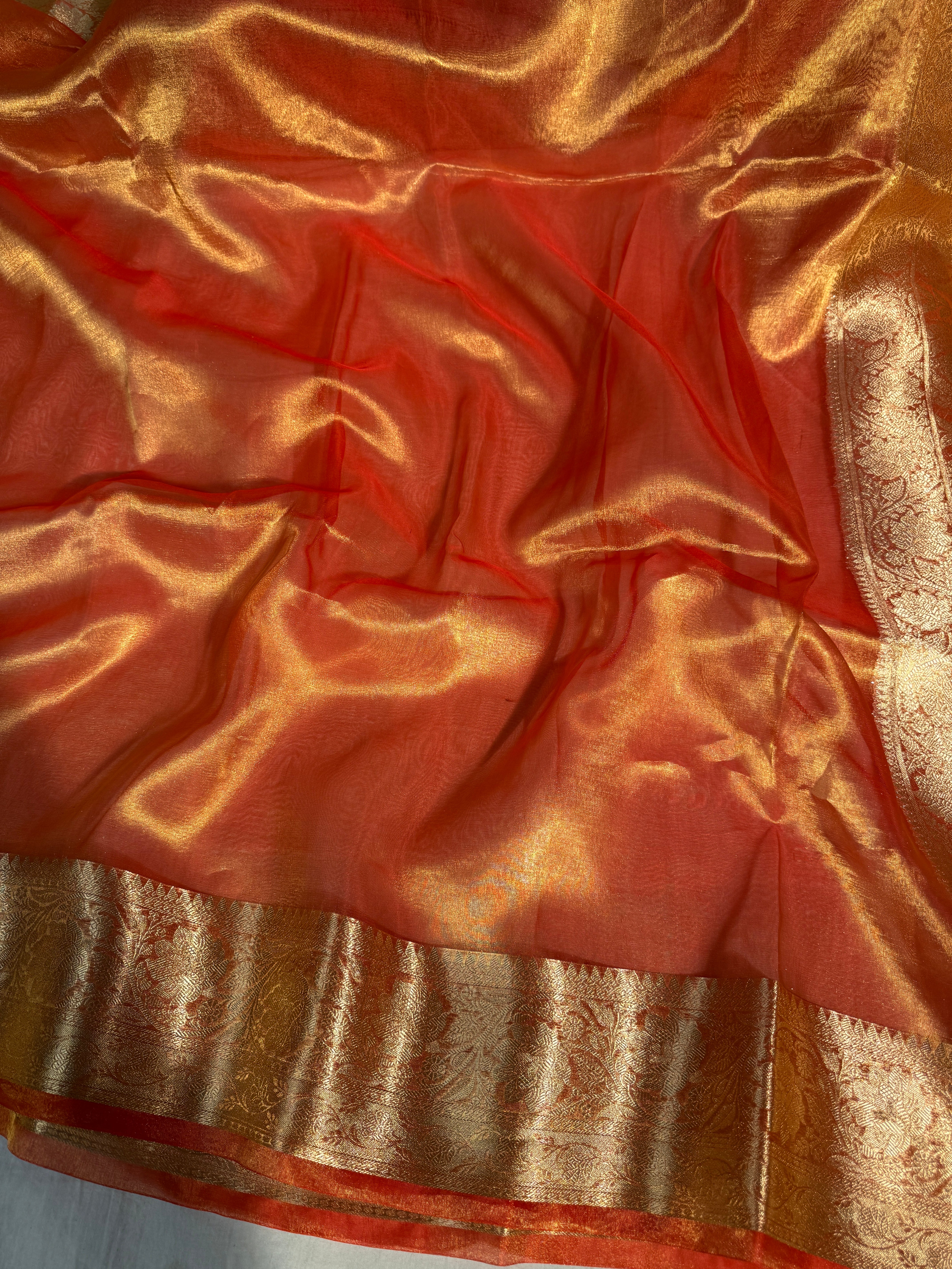 Metallic Orange Pure Tissue Silk Banarasi Saree with Traditional Weave Borders