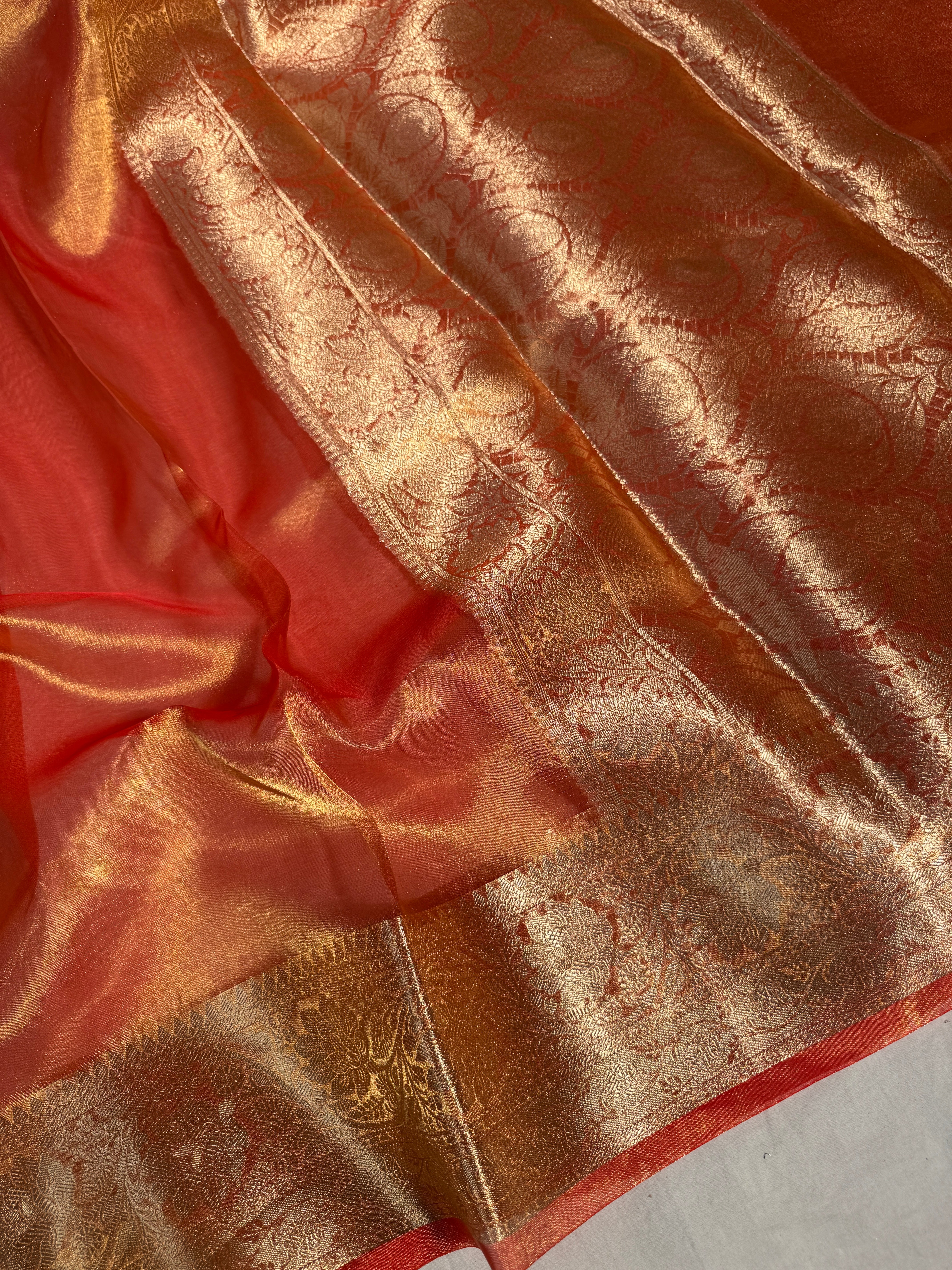 Metallic Orange Pure Tissue Silk Banarasi Saree with Traditional Weave Borders