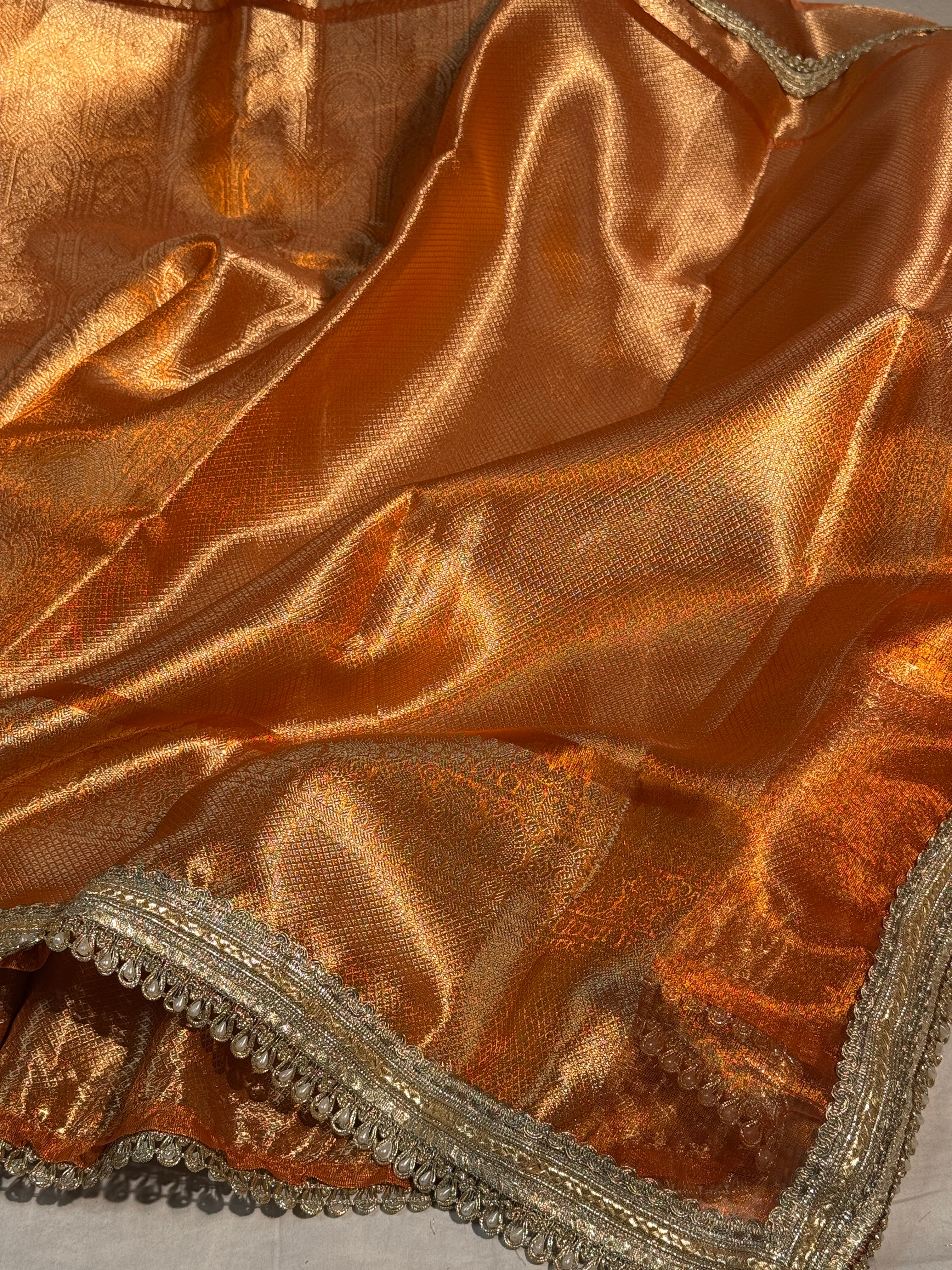 Metallic Orange Kanjeevaram Tissue Silk Moti Lace Attached Banarasi Saree